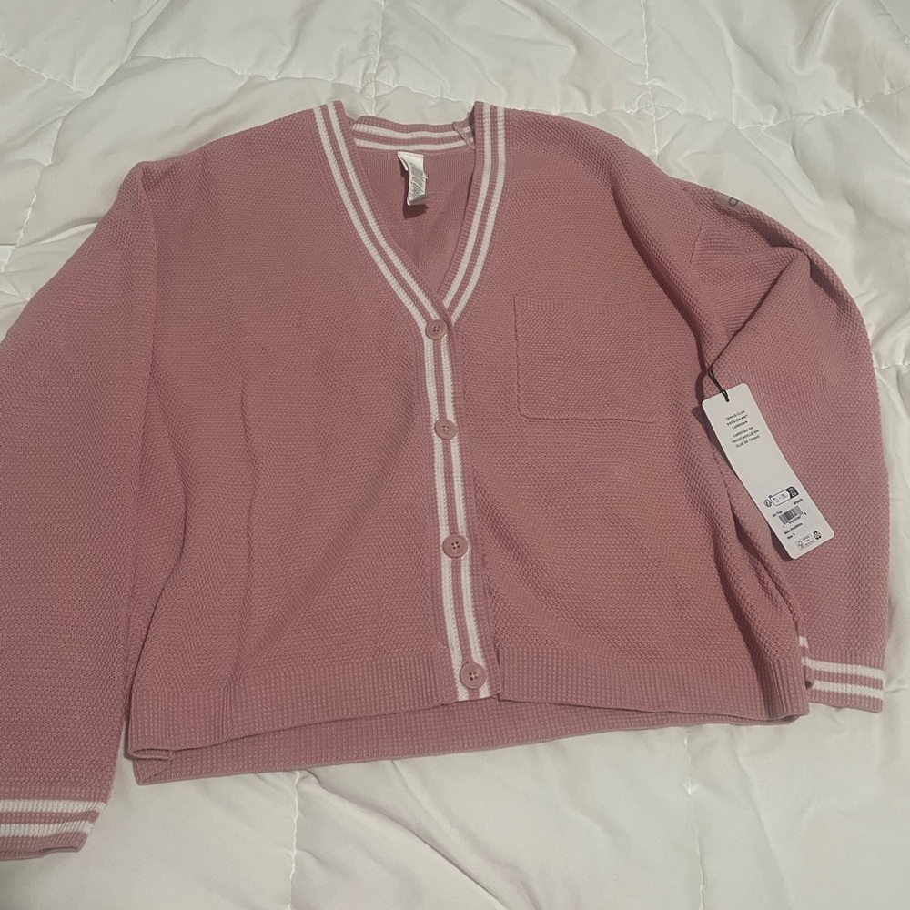 ALO knit cardigan sweater in ballet pink/white.